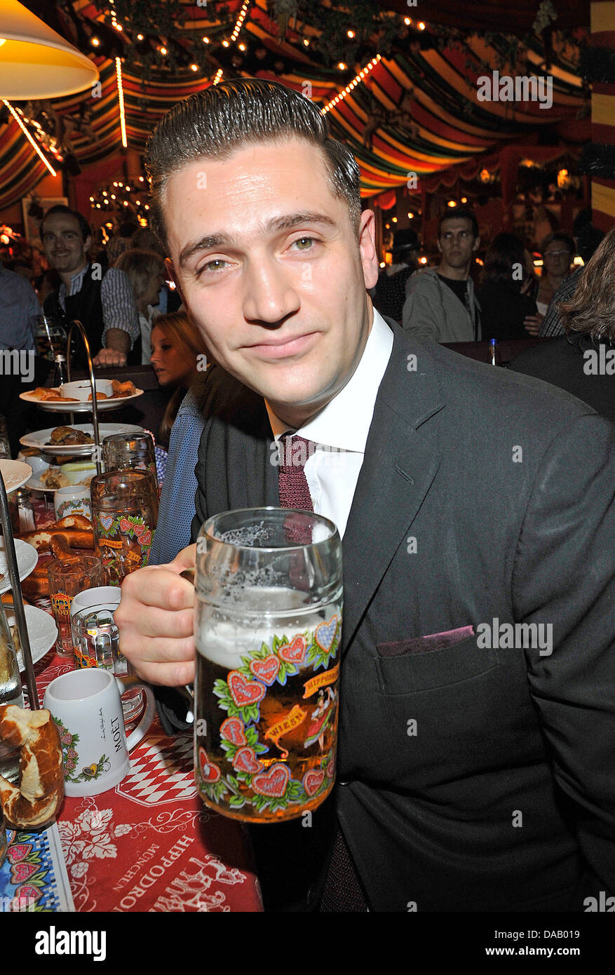Reg Traviss, ex boyfriend of Amy Winehouse,  celebrates during the Oktoberfest at the Hippodrom tent in Munich, Germany, 22 September 2011. The 178th Oktoberfest runs until 3 October and will attract visitors from all parts of the world to Bavaria. Photo: Ursula Dueren Stock Photo