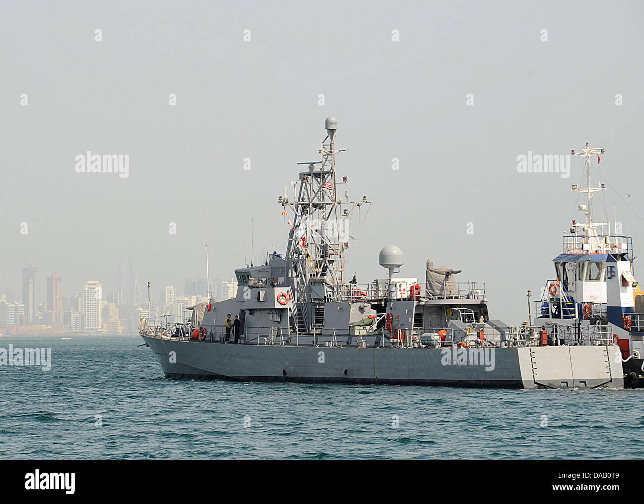 The coastal patrol ship USS Squall (PC 7) transits from Khalifa Bin Salman Port to Mina Salman Pier. The arrival of Squall, USS Stock Photo