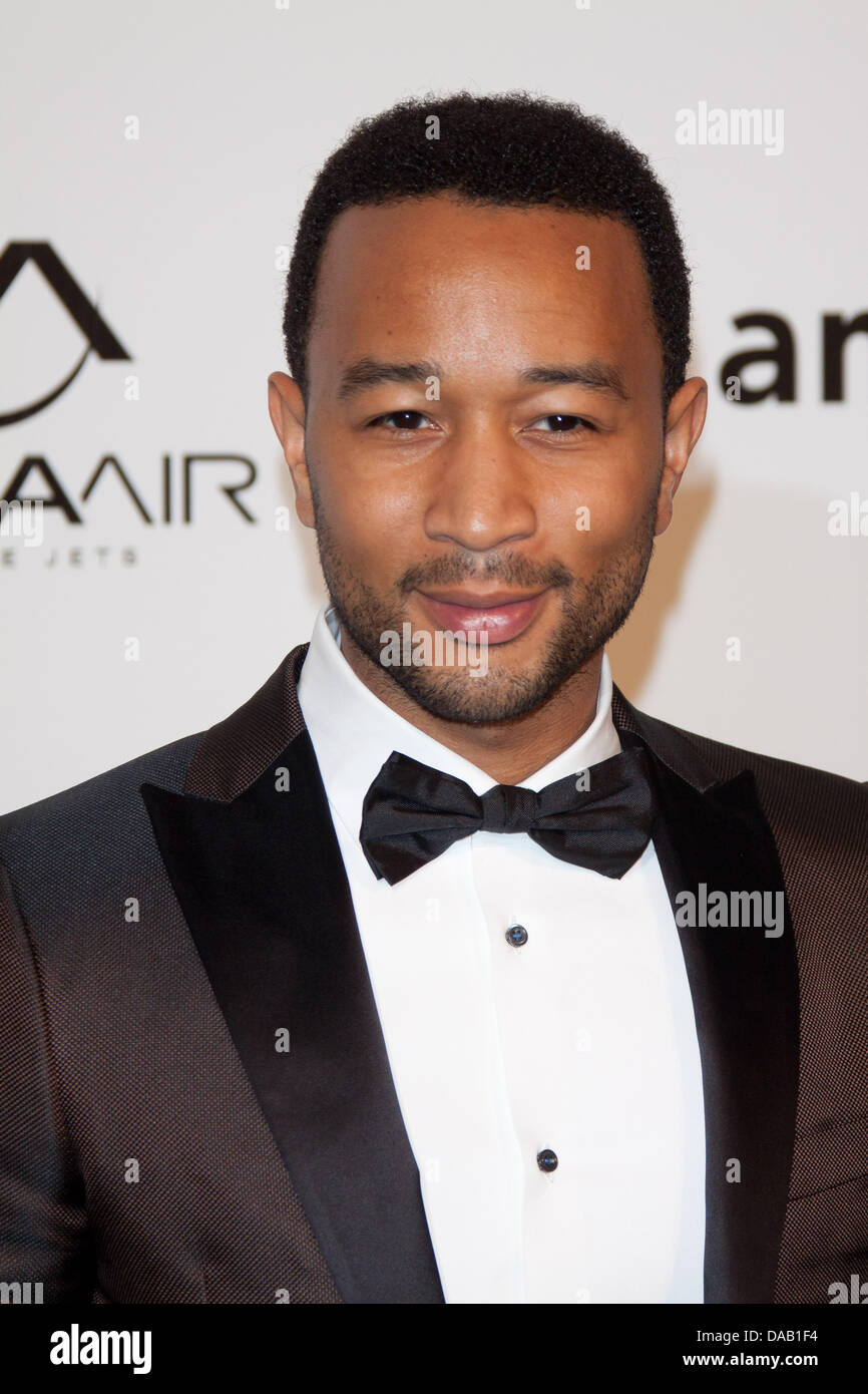 Singer John Legend attends the 2011 amfAR Milano Gala, Auction & Dinner