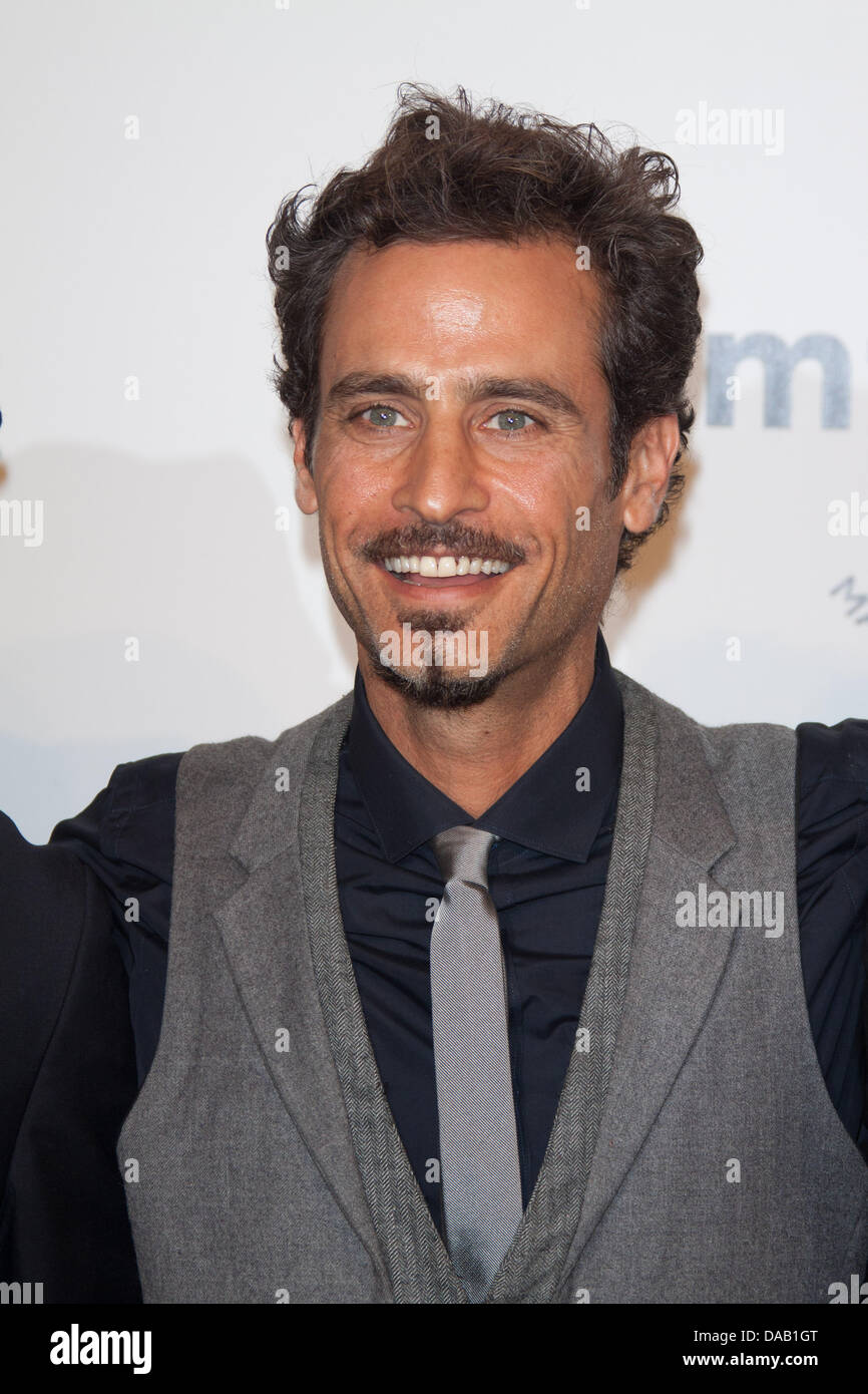 Israeli model Raz Degan attends the 2011 amfAR Milano Gala, Auction