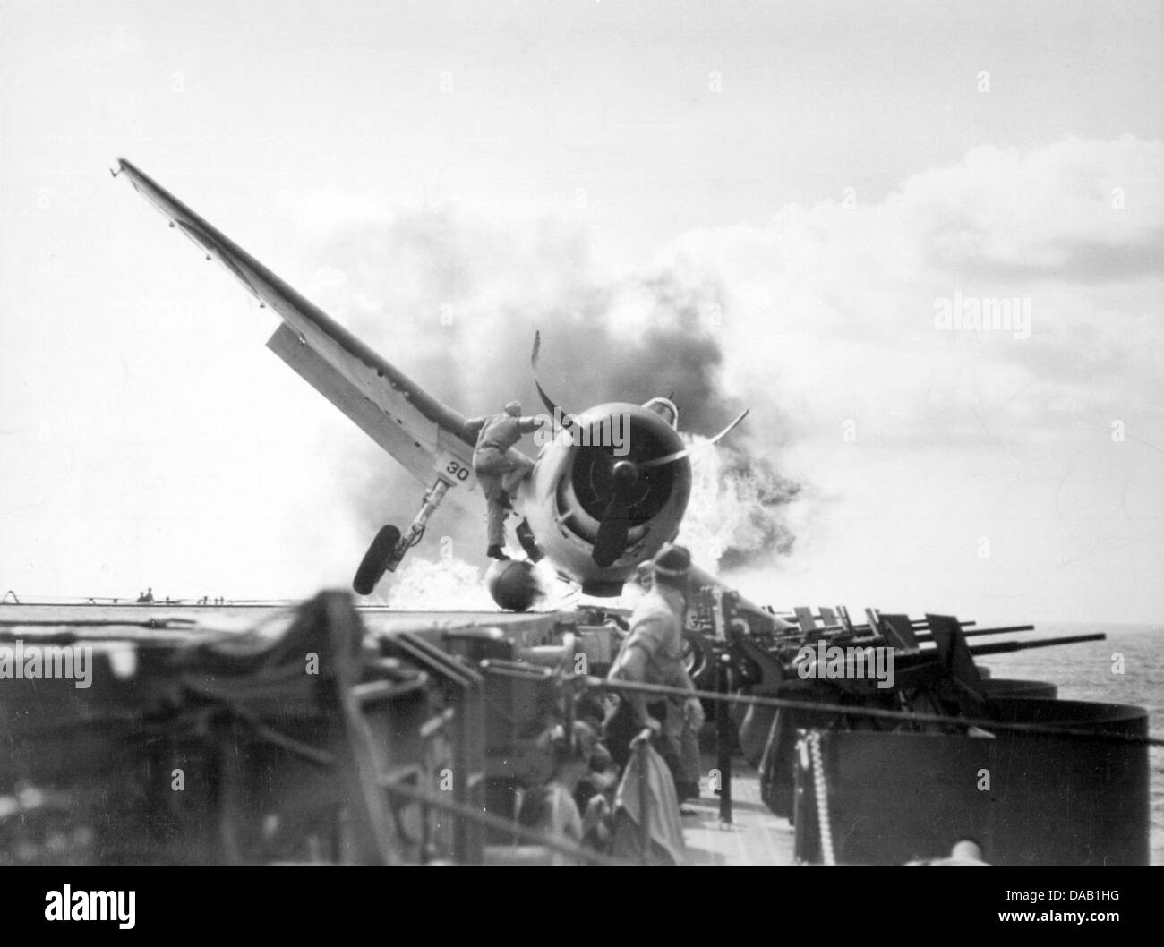 USS ENTERPRISE On 10 November 1943 a Hellcat crashed onto the Enterprise en route to attack Makin Island. See Description below Stock Photo