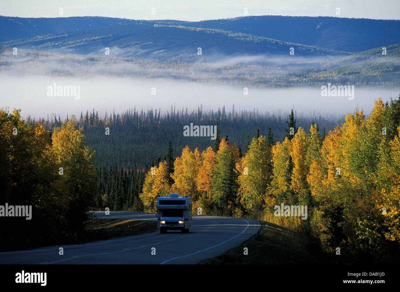 motor, home, Elliott Highway, Alaska, USA, motorhome, freeway, road, forest, trees, fall, autumn, harvest, mist, fog Stock Photo