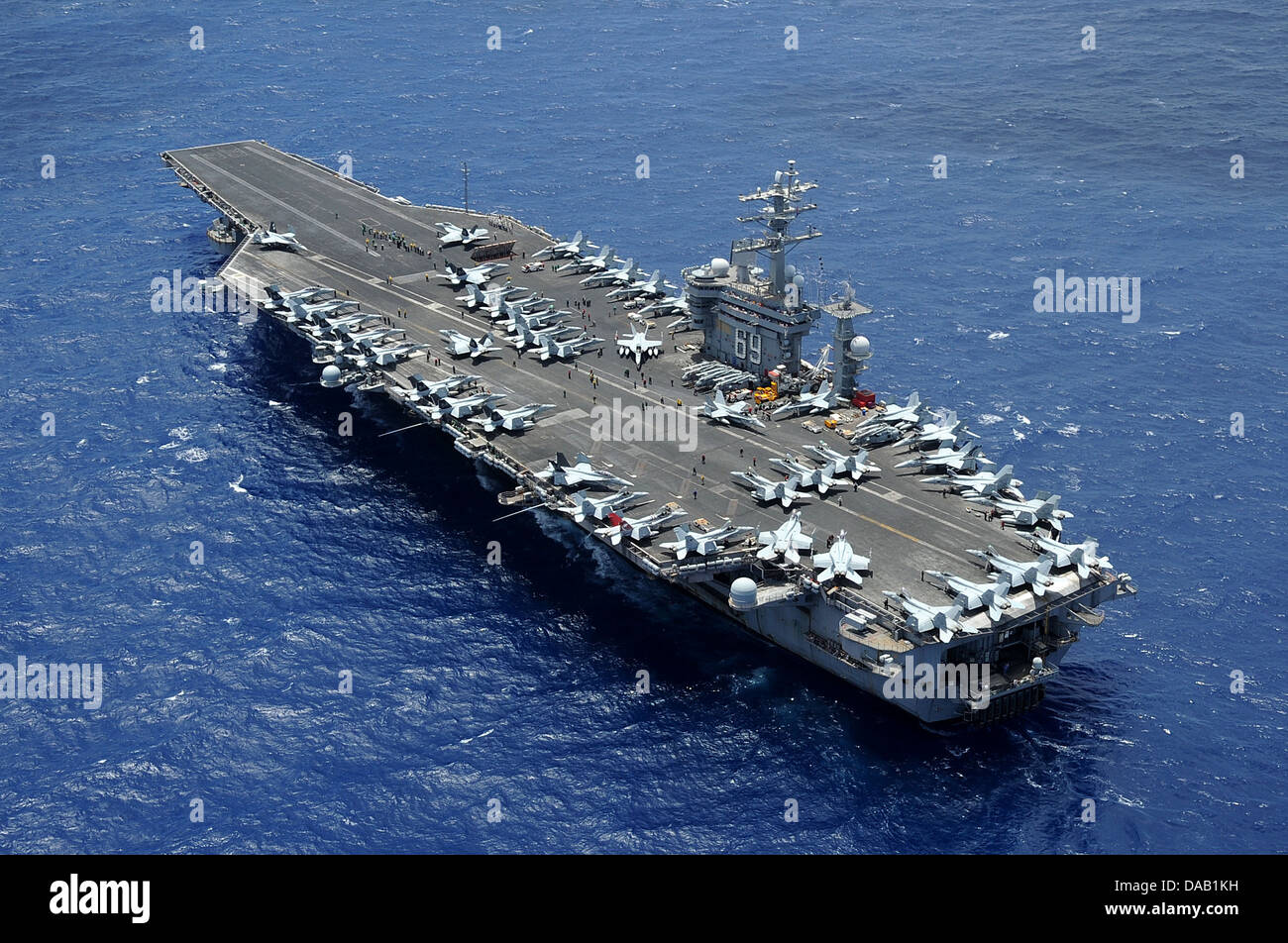 The aircraft carrier USS Dwight D. Eisenhower (CVN 69) transits the Atlantic Ocean. Dwight D. Eisenhower is returning to homeport at Norfolk, Va. after operating in the U.S. 5th and 6th Fleet areas of responsibility in support of Operation Enduring Freedo Stock Photo