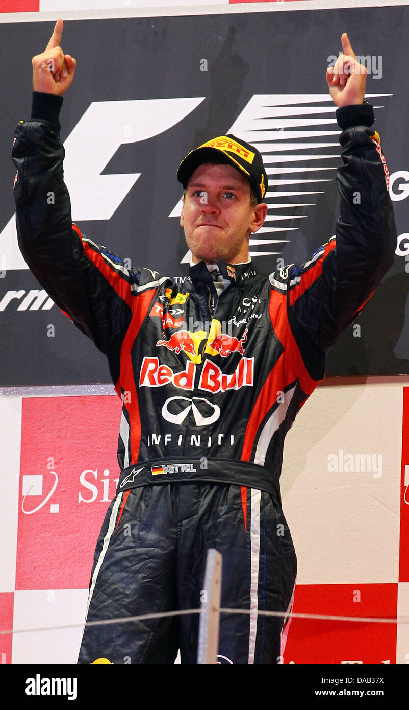 Vettel 2011 German Formula One driver Sebastian Vettel of Red Bull celebrates after ...