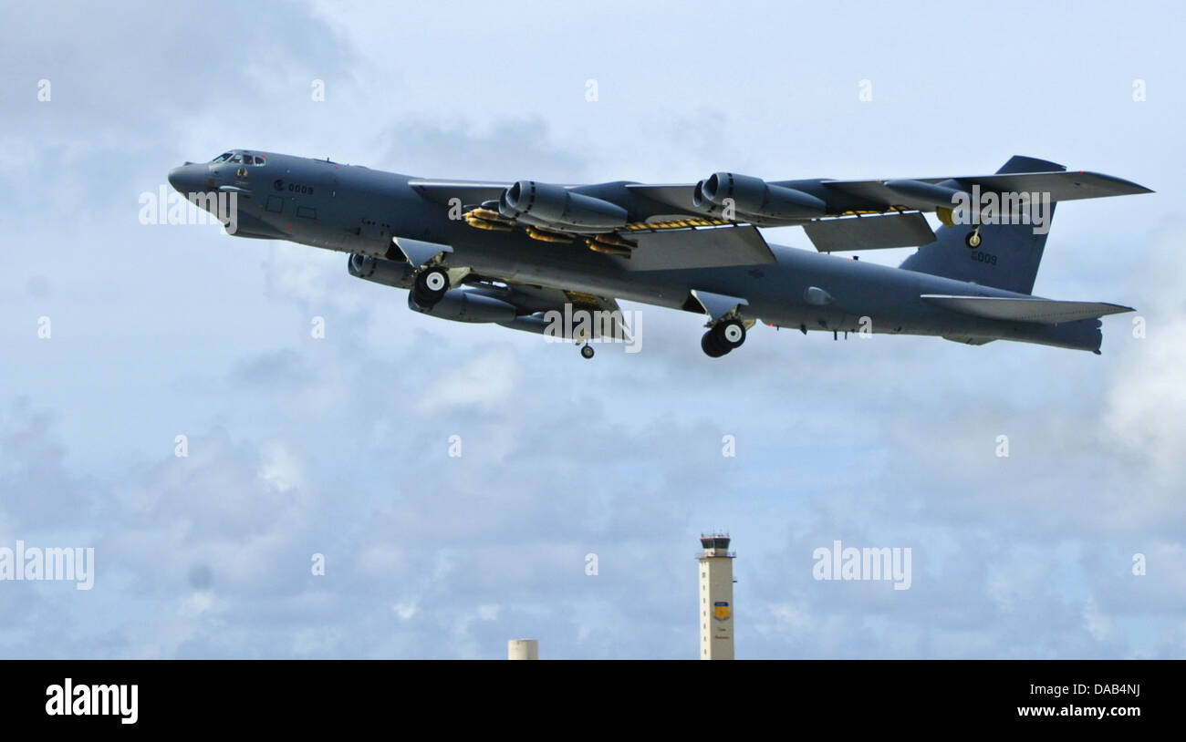 A B-52 Stratofortress from the 23rd Expeditionary Bomb Squadron, Minot Air Force Base, N.D., launches July 2, 2013, from the Andersen Air Force Base, Guam, flightline. Stock Photo