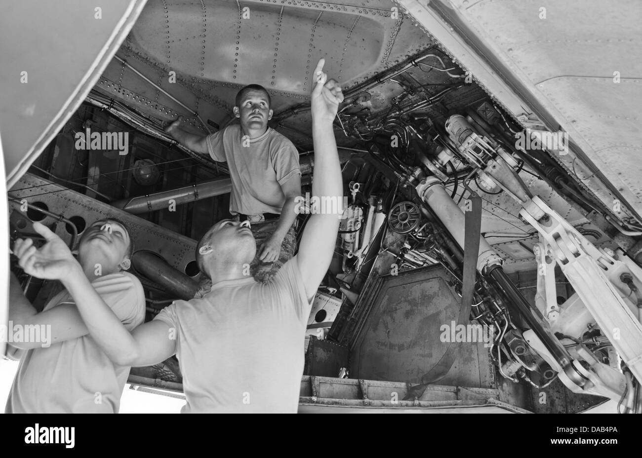Crew chiefs from the 36th Expeditionary Aircraft Maintenance Squadron perform preflight checks on a B-52 Stratofortress July 2, Stock Photo
