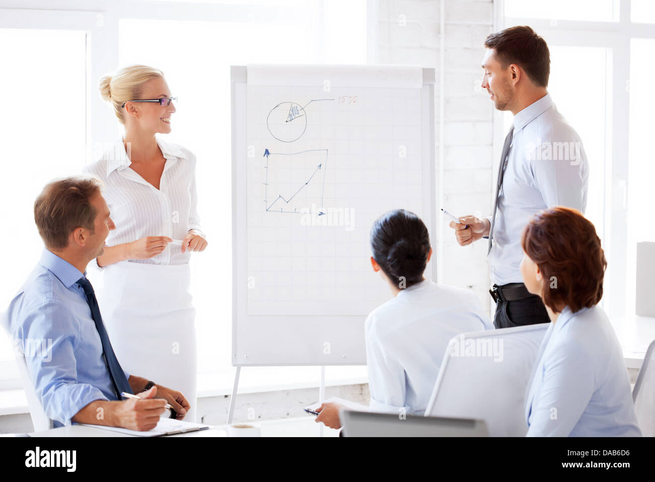 business team working with flip chart in office Stock Photo Alamy