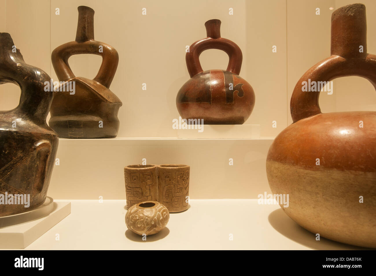 Ancient Pre-Columbian Incan Inca clay pottery vase artifacts archaeological art artwork display in the Larco Museum, Lima, Peru. Stock Photo