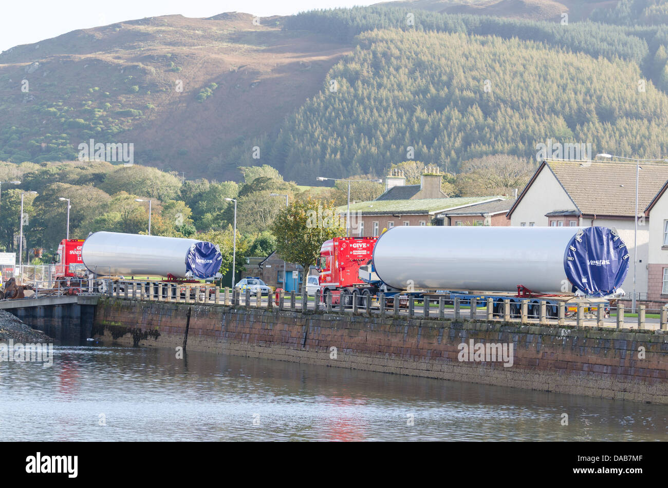 Two lorries carrying tower sections for wind turbines from Machrihanish parked in Campbeltown prior to outloading by ship Stock Photo