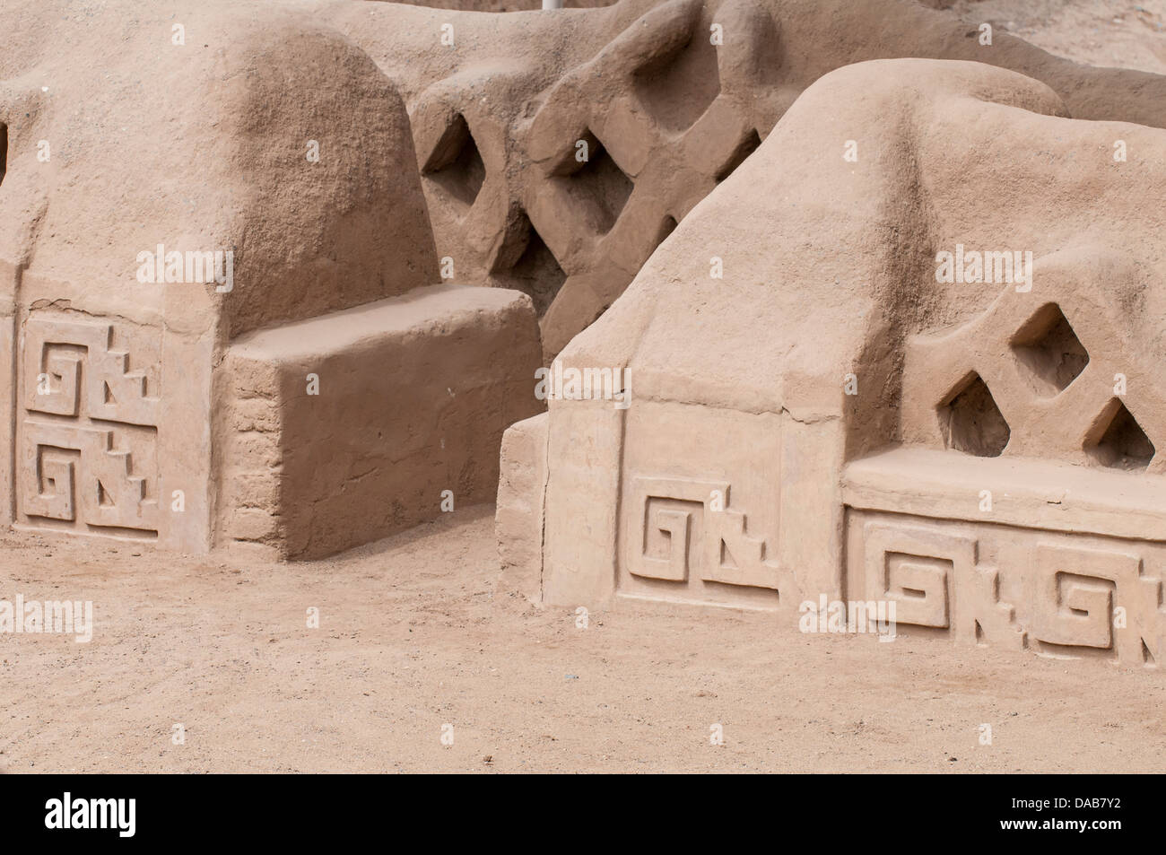 Petrogylph relief at ancient ruins of Chan Chan Pre-Columbian archaeological unesco world heritage site near Trujillo, Peru. Stock Photo