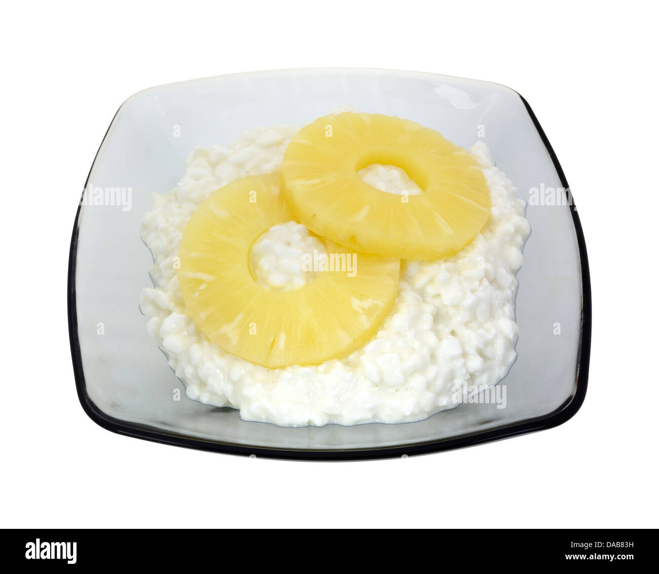 A Large Serving Of Large Curd Cottage Cheese With Two Sliced Of