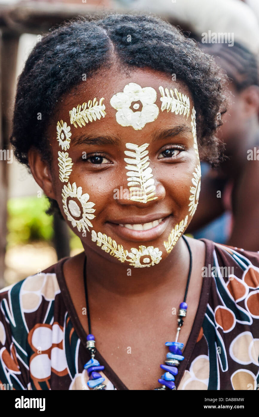 Sakalava young woman with his traditional beauty mask in Nosy Be, Madagascar Stock Photo