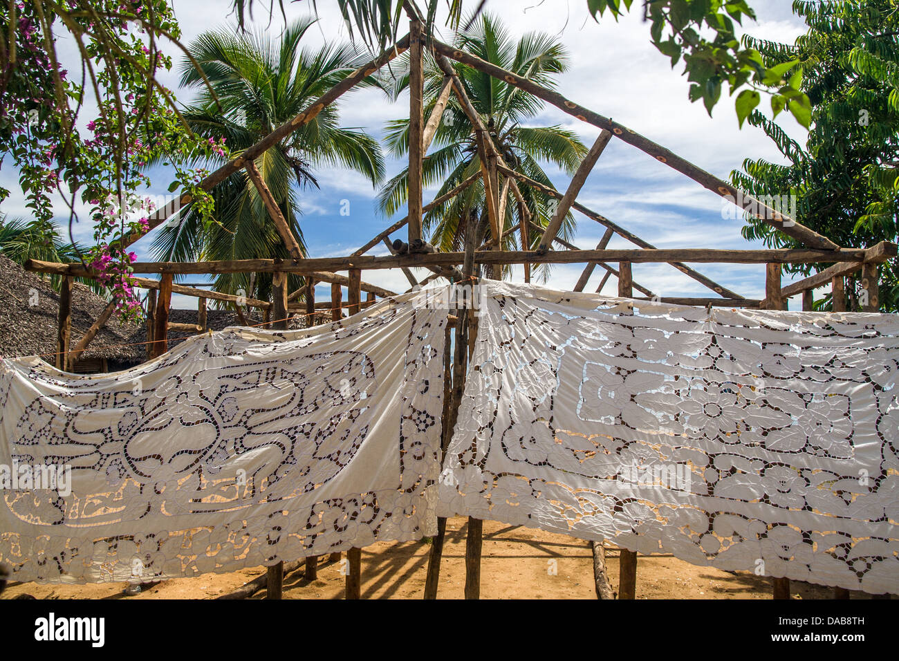 Selling embroidered tablecloths in Nosy Komba (Nosy Be), Madagascar Stock Photo