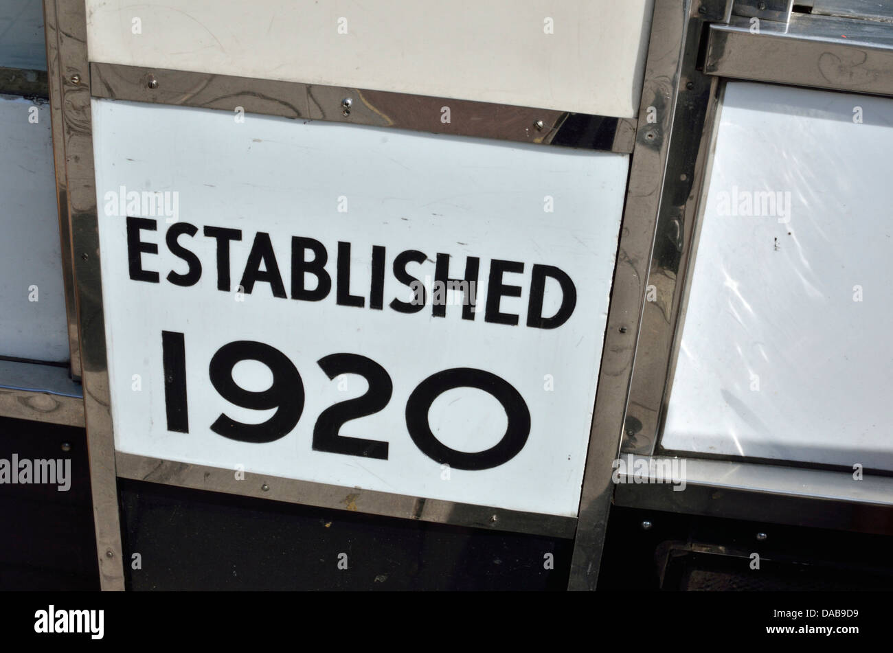 'Established 1920' sign outside a cafe Stock Photo