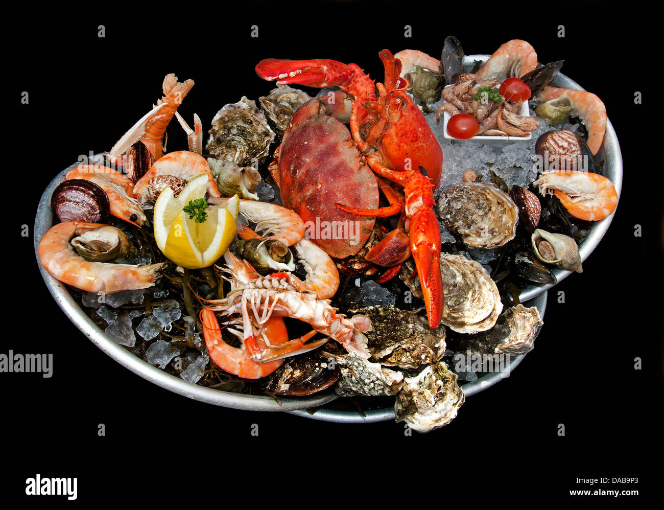 Fruits de mer French seafood Oysters Shrimp Lobster Periwinkle Crab Prawns Langoustine Mussels Scallops Clams Stock Photo