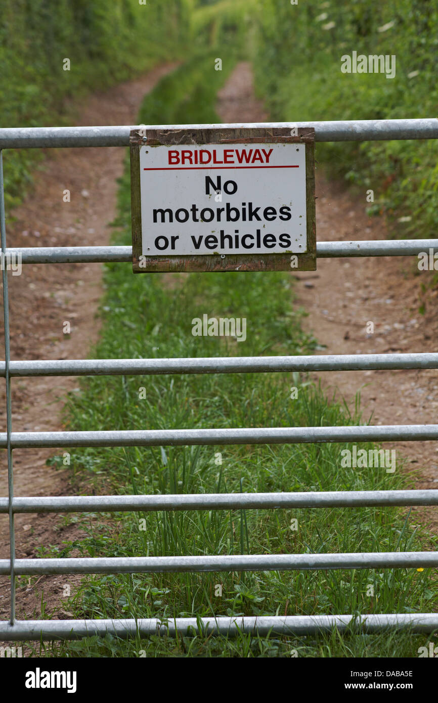 Bridleway no motorbikes or vehicles sign on gate at Cranborne, Dorset in July Stock Photo
