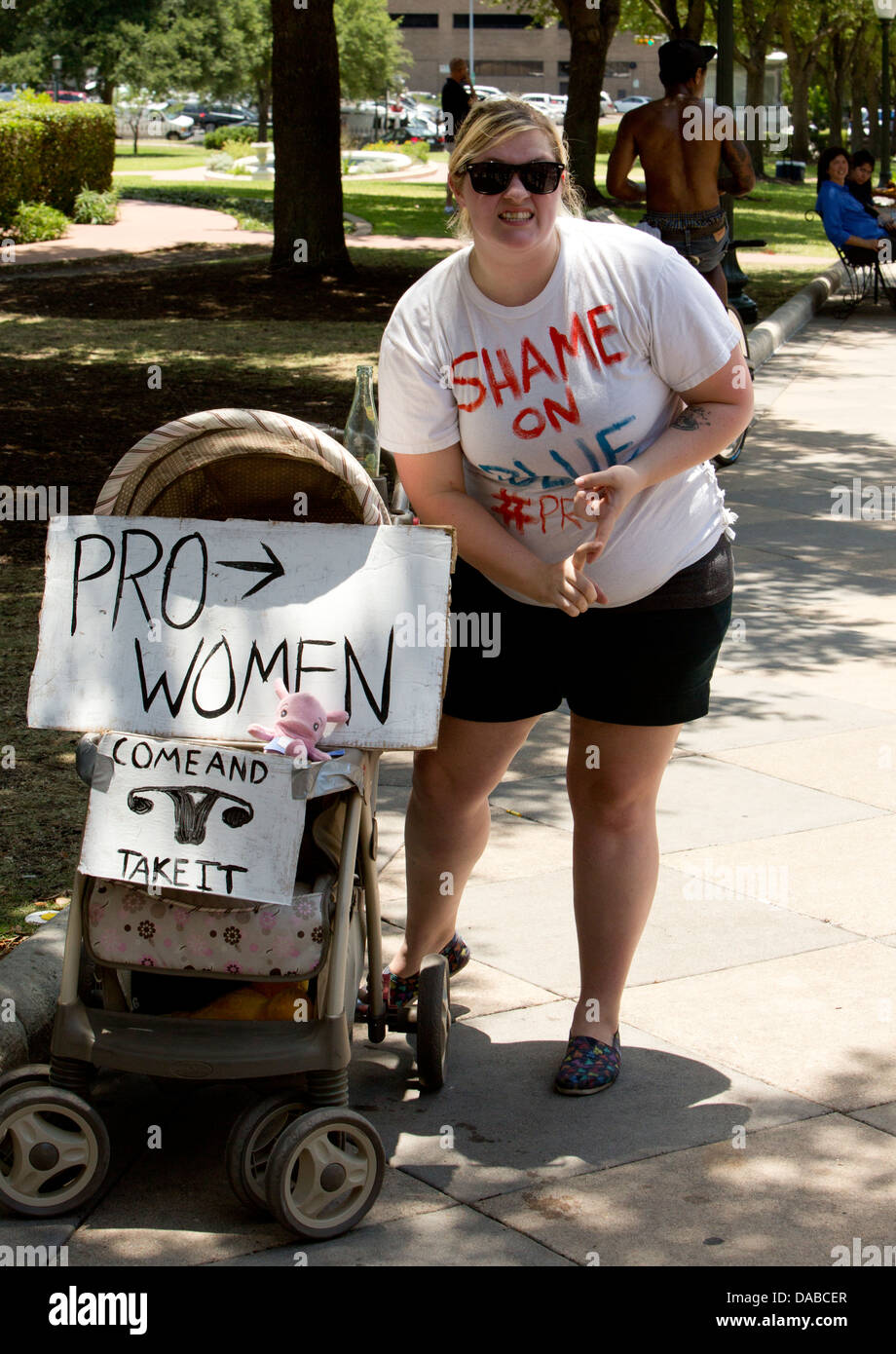 Pro-choice white woman speaks against regulations on abortion availability in Texas. The Texas legislature is considering new re Stock Photo