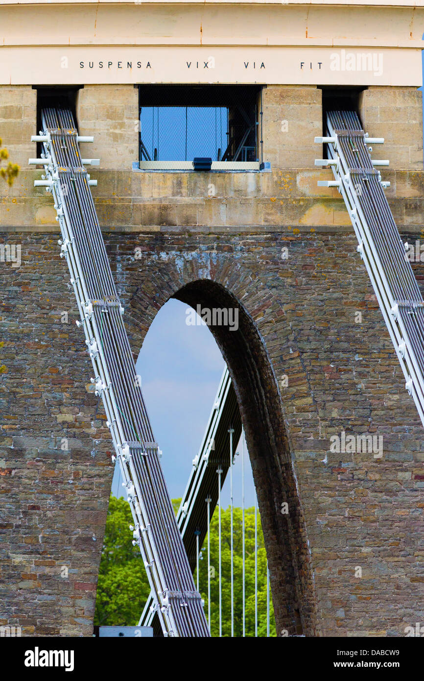 West tower of the Clifton Suspension Bridge in Bristol UK with motto ' Suspensa Vix Via Fit ' Stock Photo