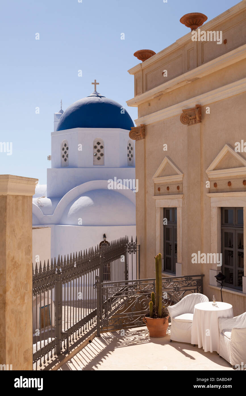 'Zannos Melathron' Hotel and greek church, Pyrgos village, Santorini, Greece Stock Photo