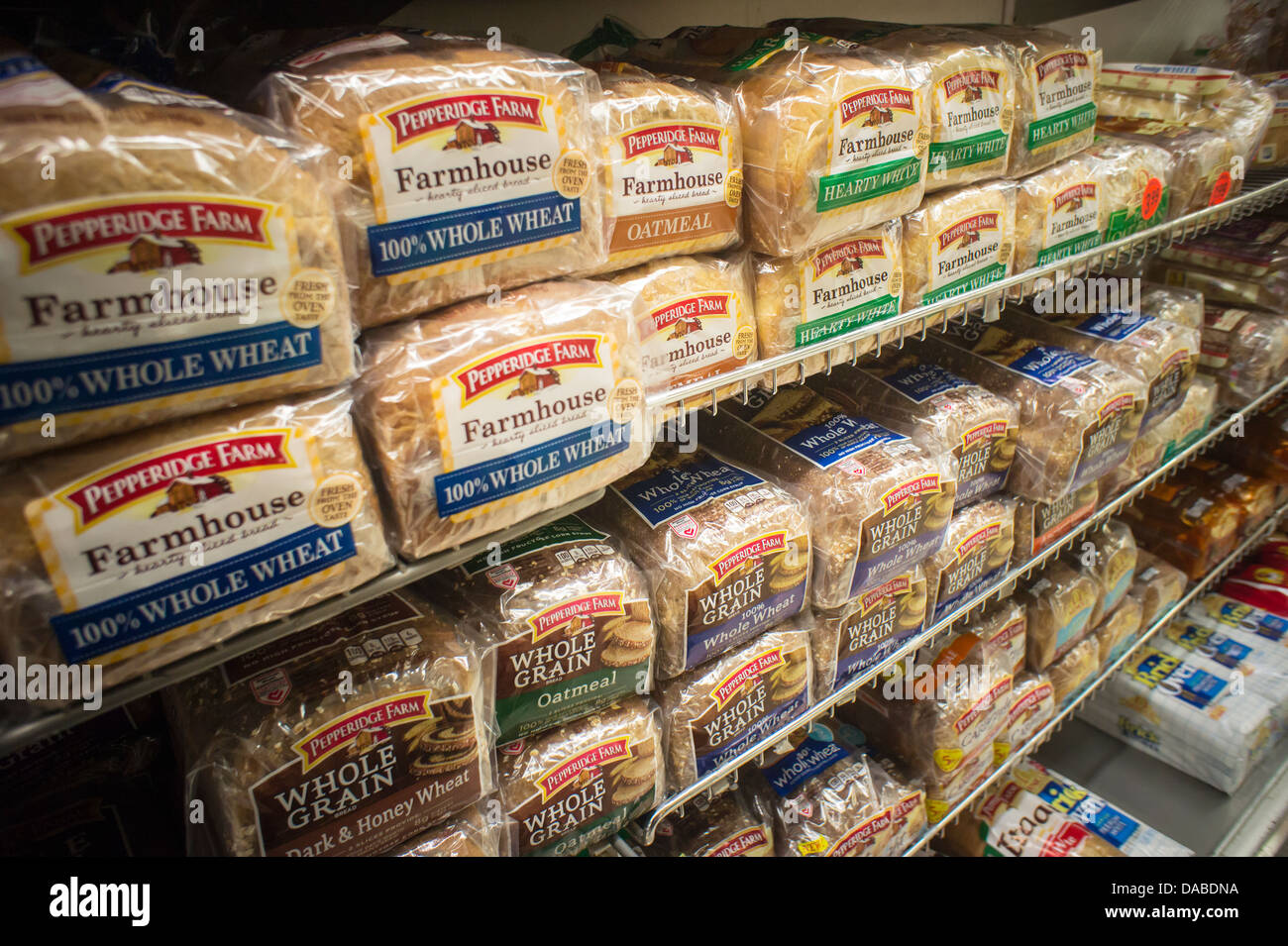 Loaves of different varieties of Pepperidge Farm breads are seen on a supermarket shelf in New York Stock Photo
