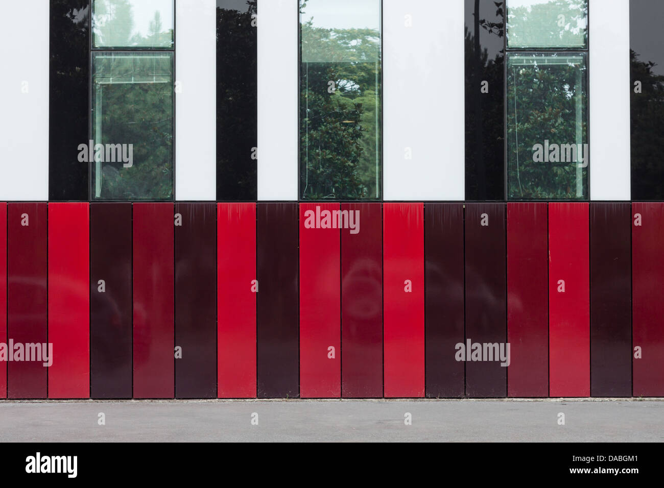 Architectural detail of modern building with red stripes Stock Photo