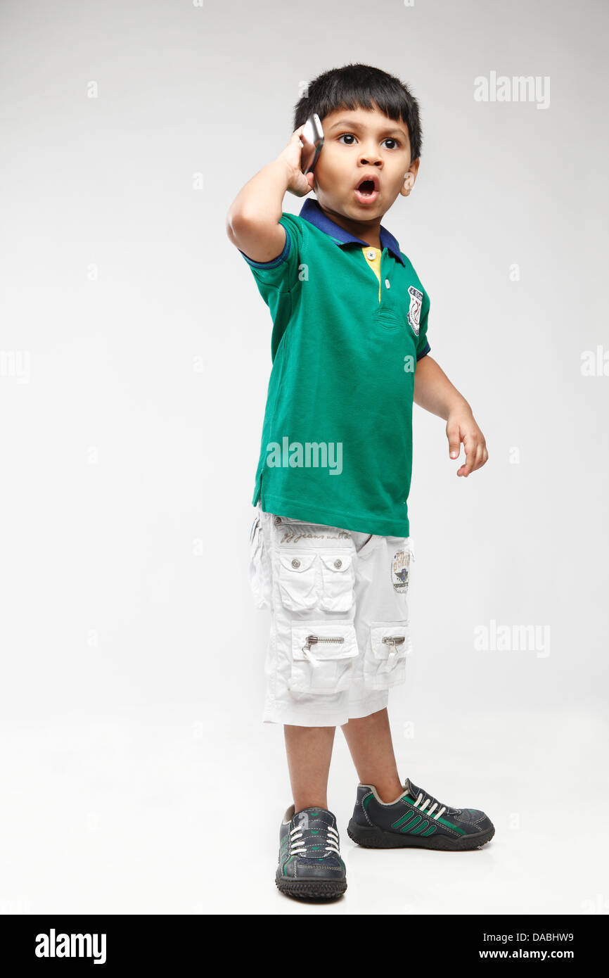 Little 5 year old Indian kid talking on mobile Stock Photo Alamy