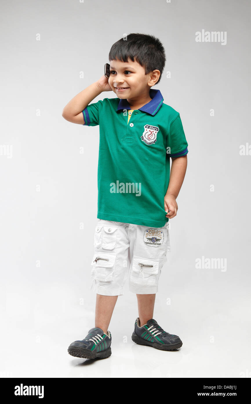 Little 5 year old Indian kid talking on mobile Stock Photo Alamy