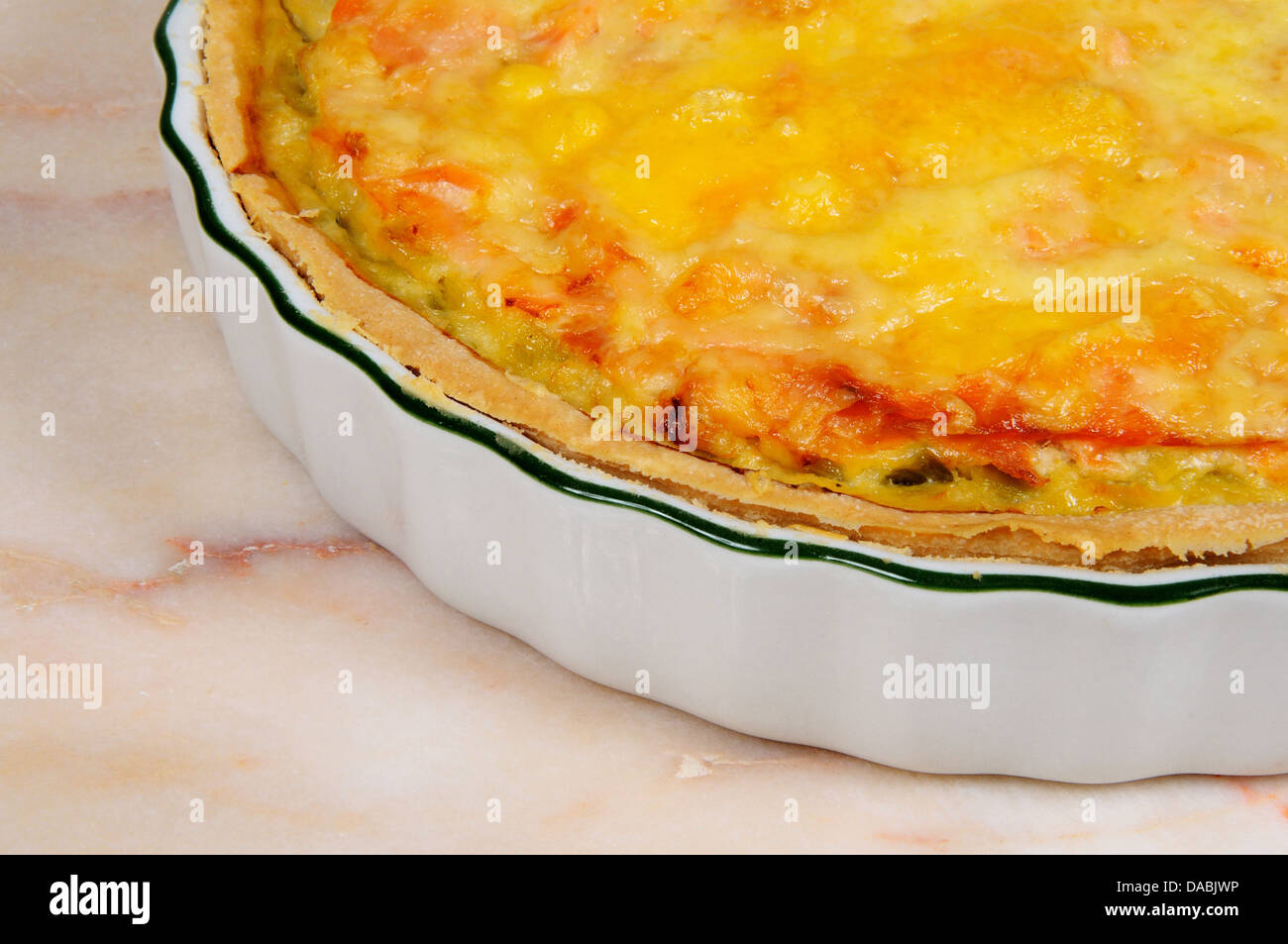 Smoked salmon and leek tart in a flan dish Stock Photo Alamy