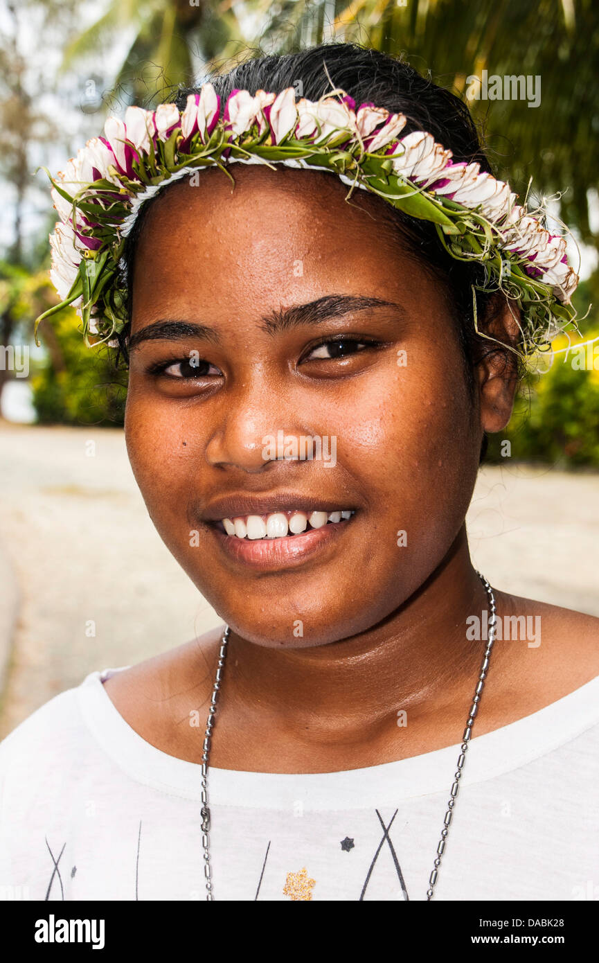 Young girl with flowers in her hair, Island of Yap, Federated States of Micronesia, Caroline Islands, Pacific Stock Photo