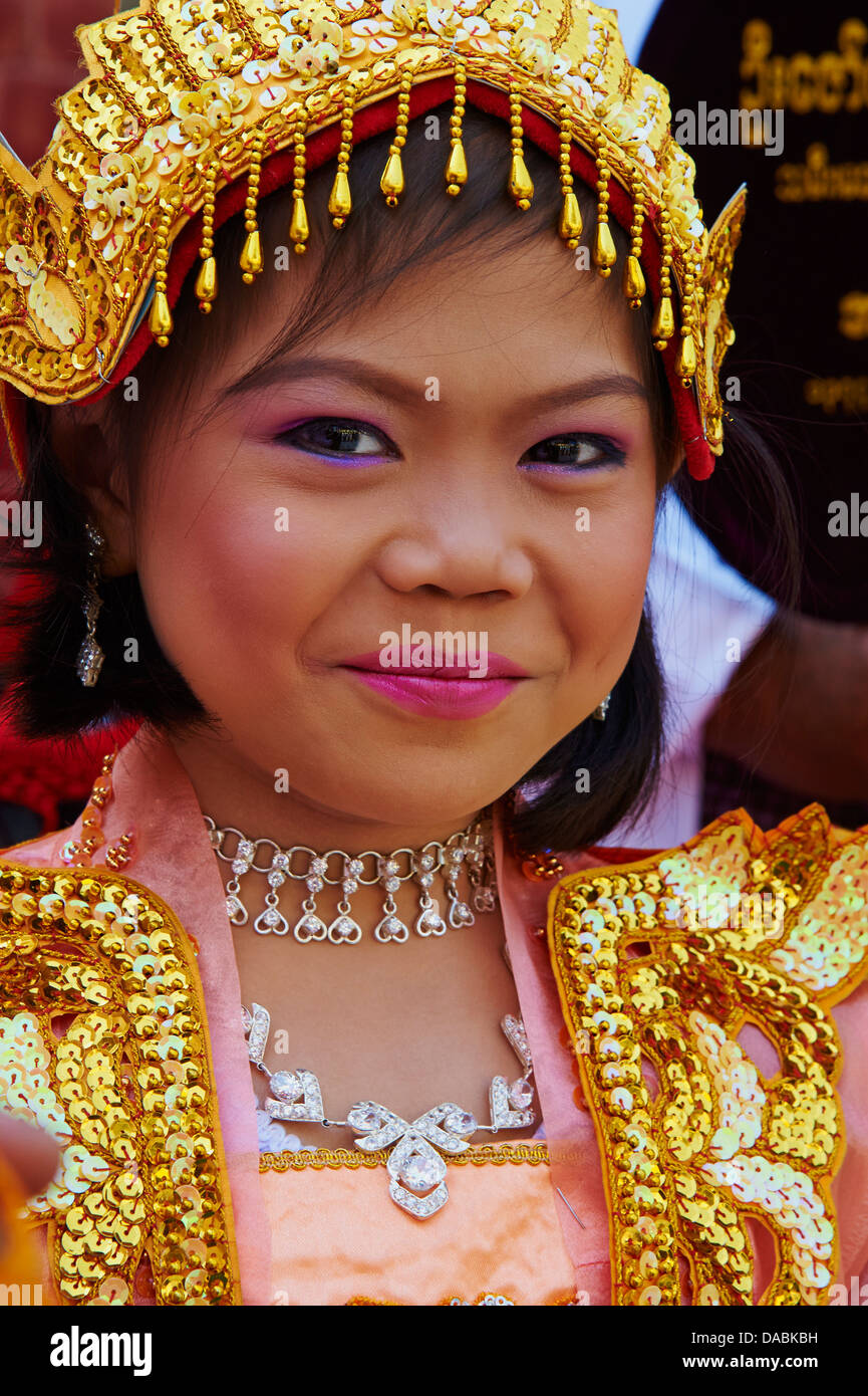 Young Burmese girl during ritual for becoming a nun, Paya Mahamuni, Mandalay, Myanmar (Burma), Asia Stock Photo