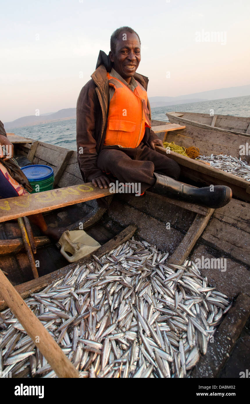 Fisherman on Lake Tanganyika early morning fishing for cichlids to sell in the local fish market, Zambia, Africa Stock Photo