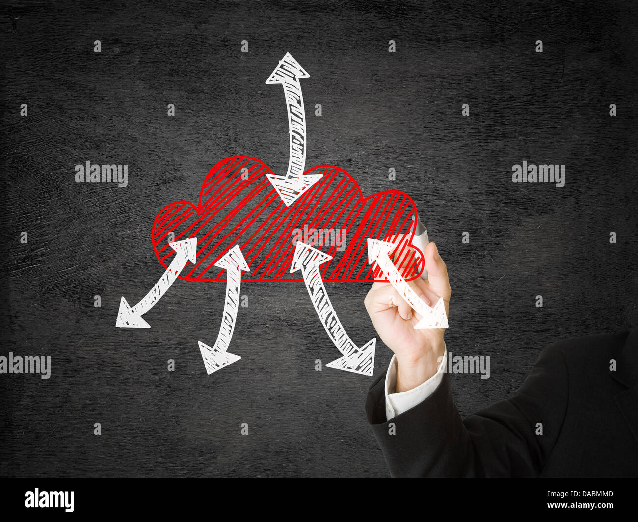 Businessman drawing cloud with in and outgoing arrows Stock Photo