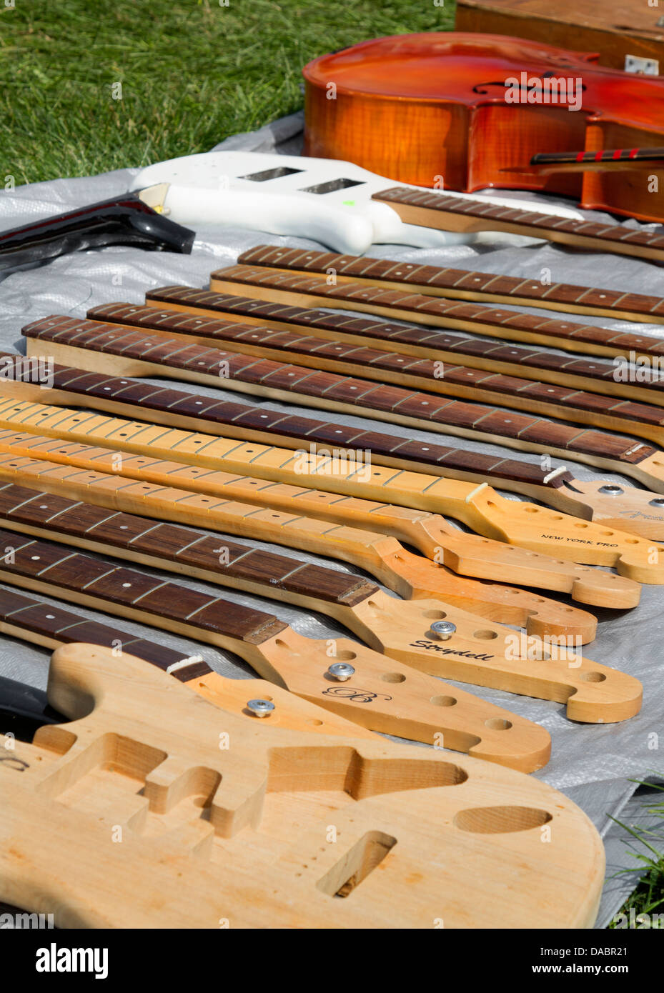 Guitar necks at a flea market Stock Photo Alamy