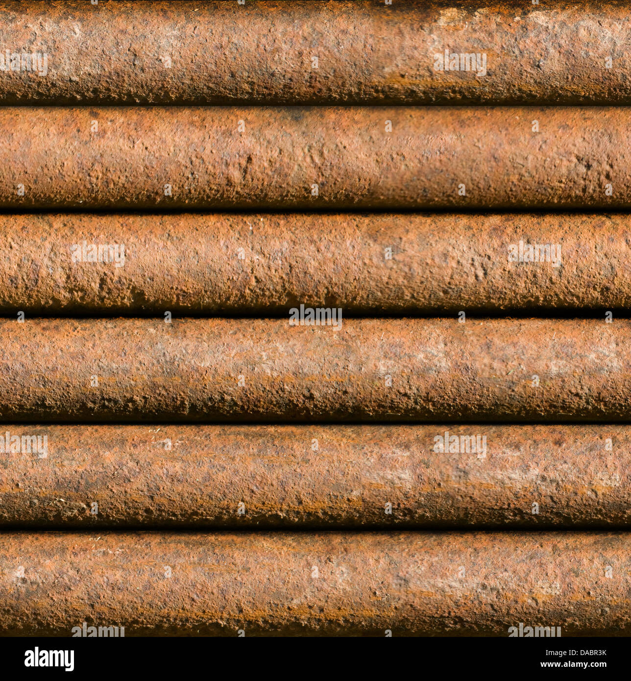 Horizontal rusty pipe background texture seamlessly tileable Stock Photo