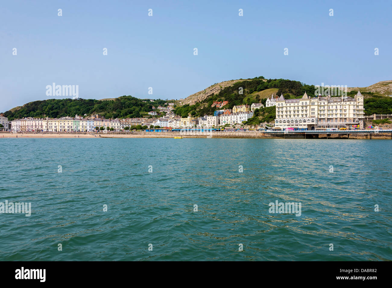 Llandudno pier and the Great Orme on the North Bay of the North Wales seaside town. Stock Photo