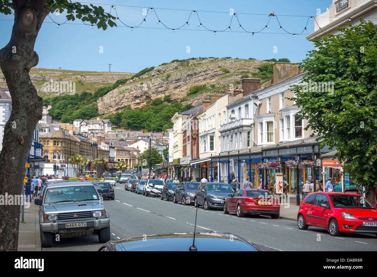 The main shopping street in Llandudno, Clwyd North Wales with the Great Orme in the background. Stock Photo