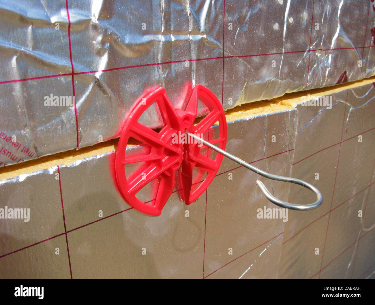 Retaining clips to hold celotex insulation boards in place in