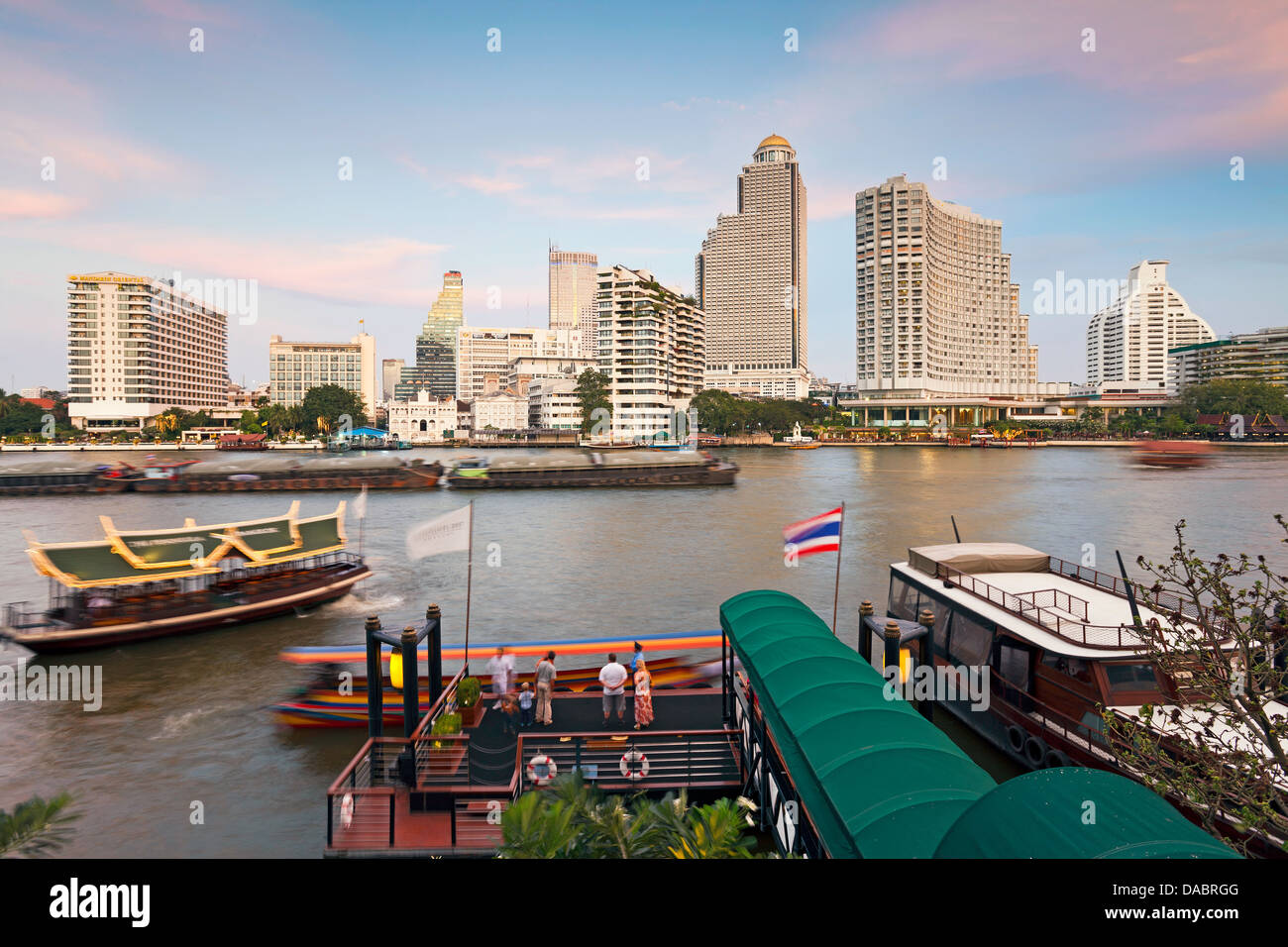 Chao Phraya River and the modern Bangkok skyline, Bangrak district, Bangkok, Thailand, Southeast Asia, Asia Stock Photo