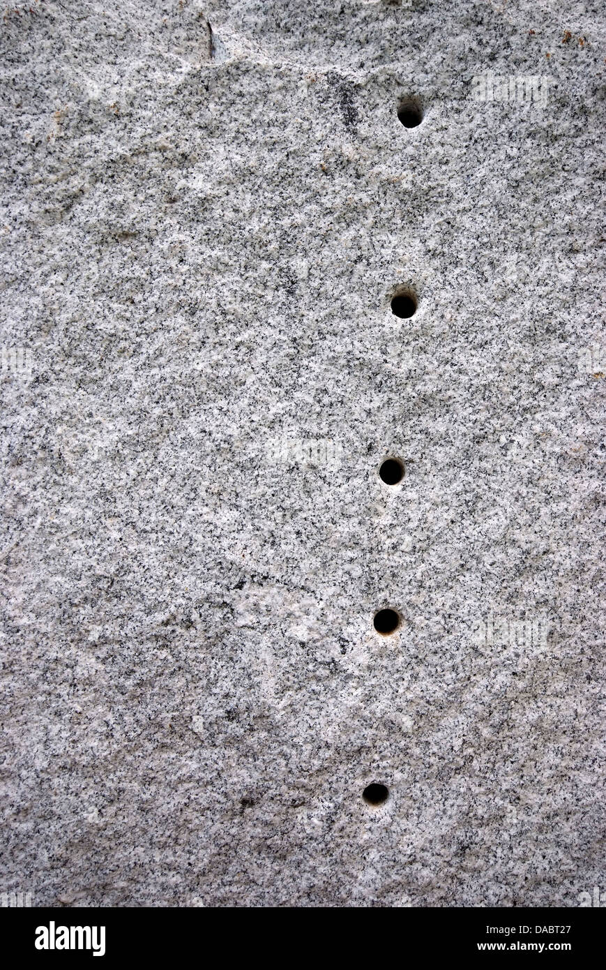 Round hole on the granite.The surface of Black and white granite stone. For texture background Stock Photo