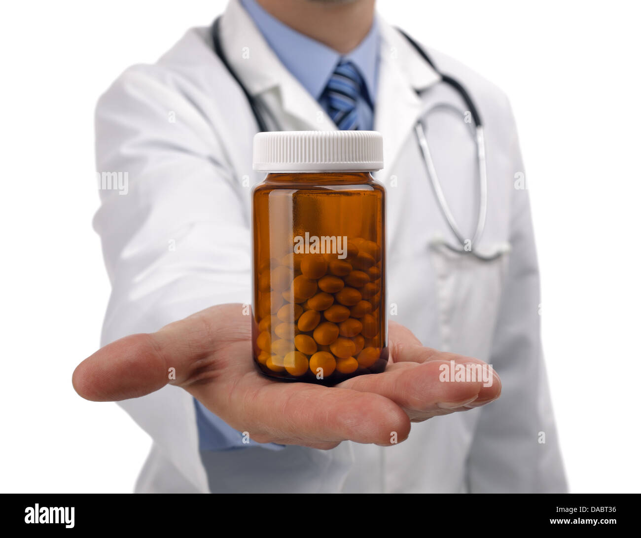 Doctor holding bottle of pills Stock Photo