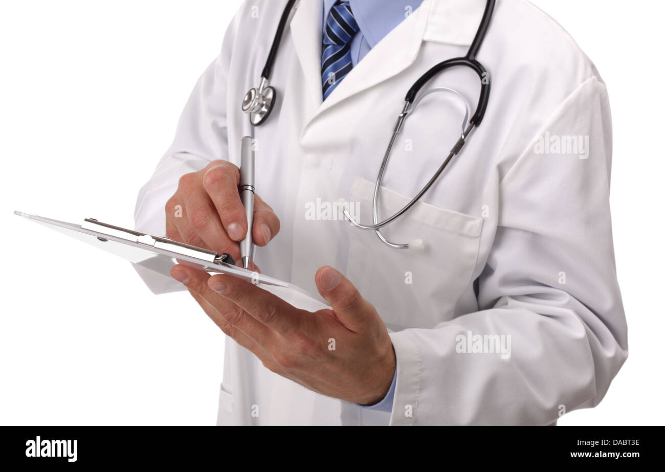Doctor writing on medical chart Stock Photo