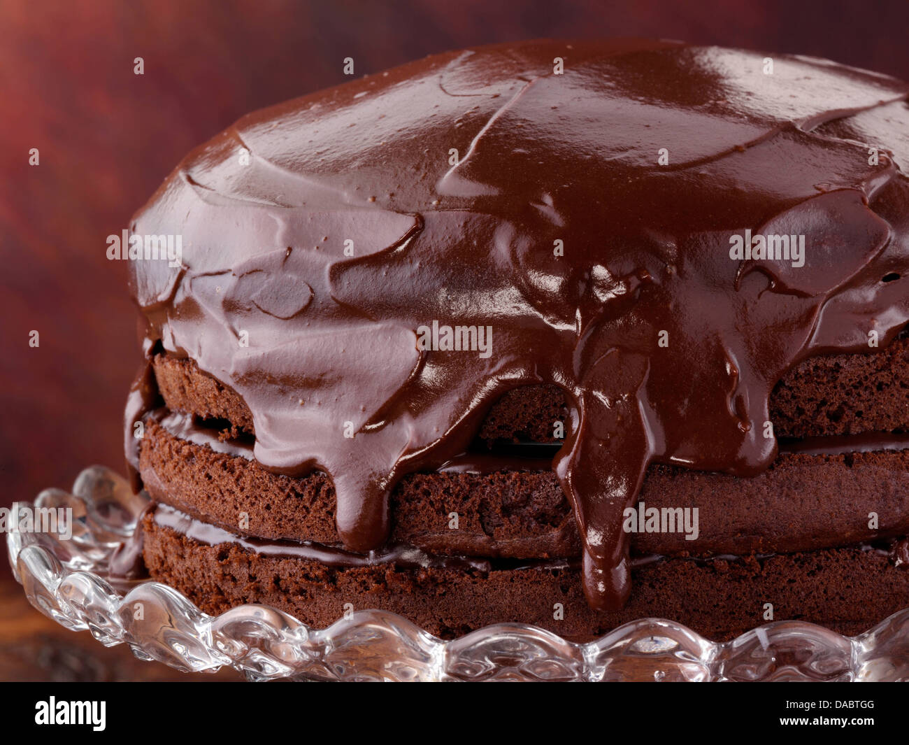 Whole frosted chocolate layer cake hi-res stock photography and images ...