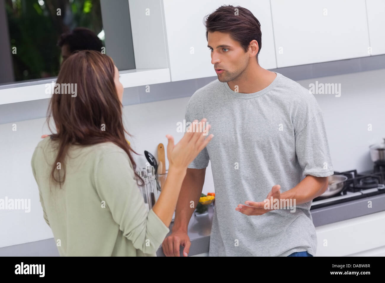 Couple arguing in the kitchen Stock Photo