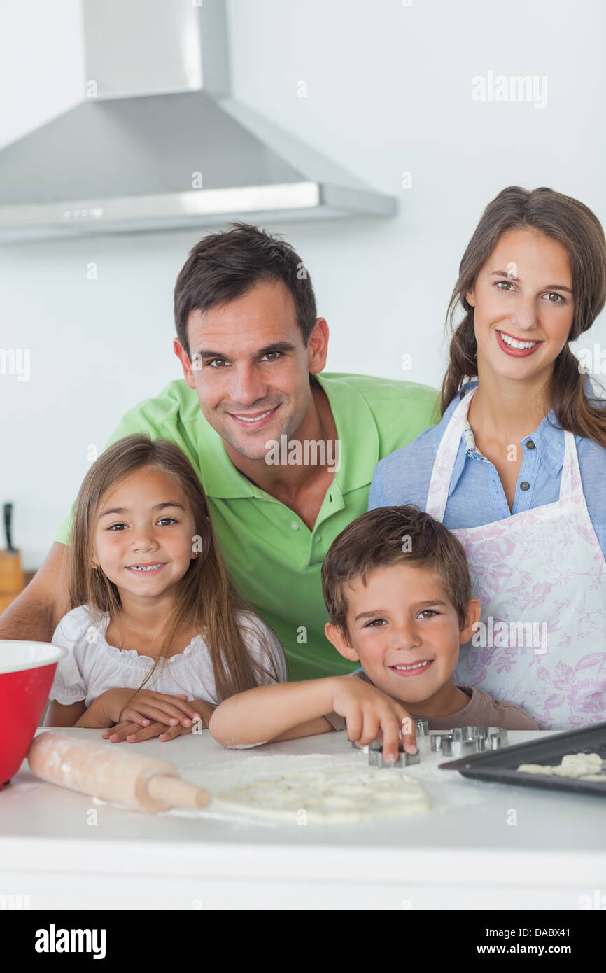 Family home baking together in the kitchen Stock Photo