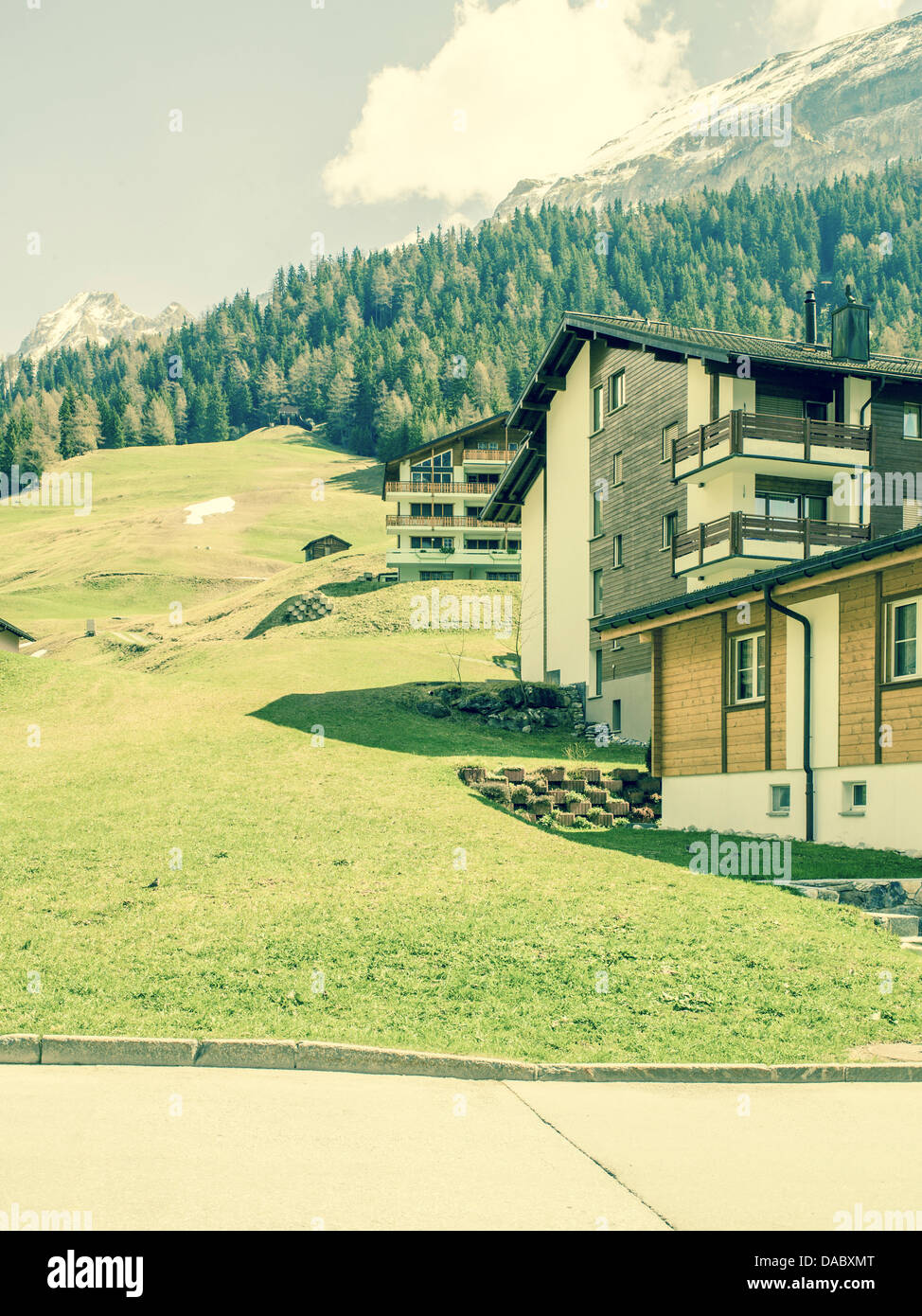 Chalets in Swiss Mountain town Stock Photo
