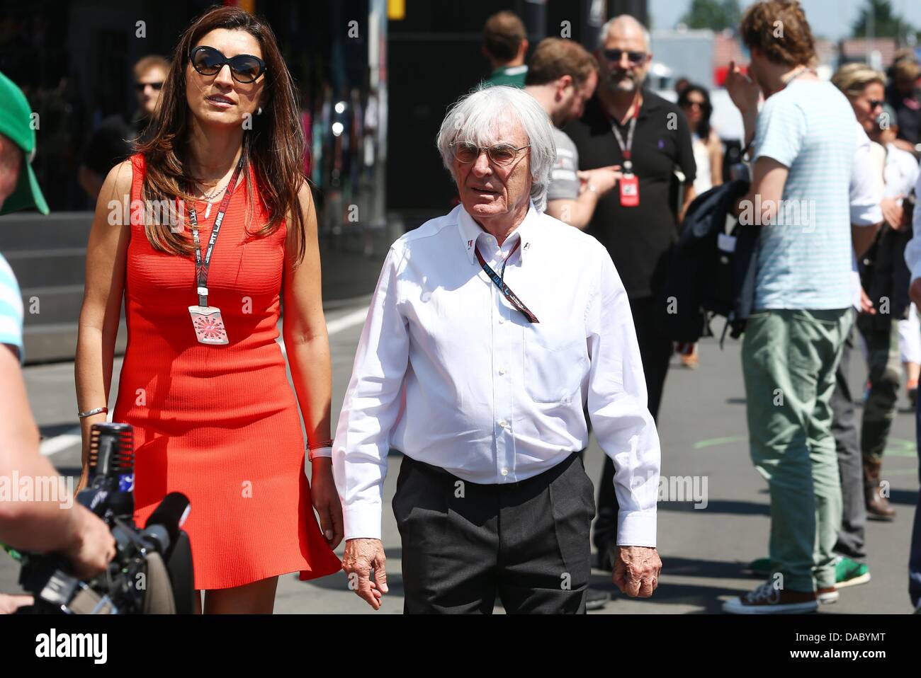 British Formula One Boss Bernie Ecclestone and his wife Fabiana Flosi seen at the Nuerburgring circuit in Nuerburg, Germany, 07 July 2013. Photo: Jens Buettner/dpa Stock Photo