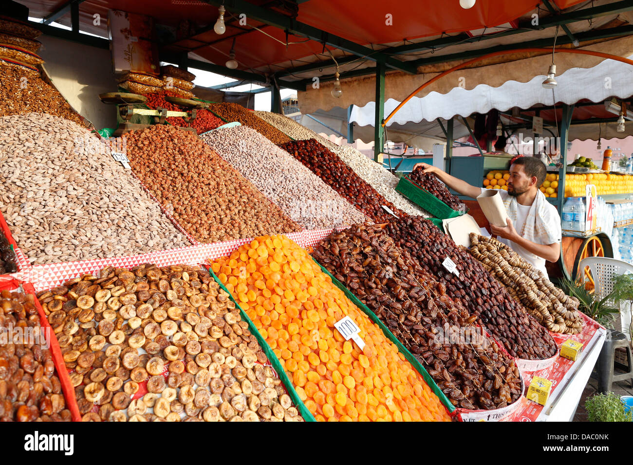 Dried nuts and fruits on a stand in a souk in Marrakech, Morocco, North