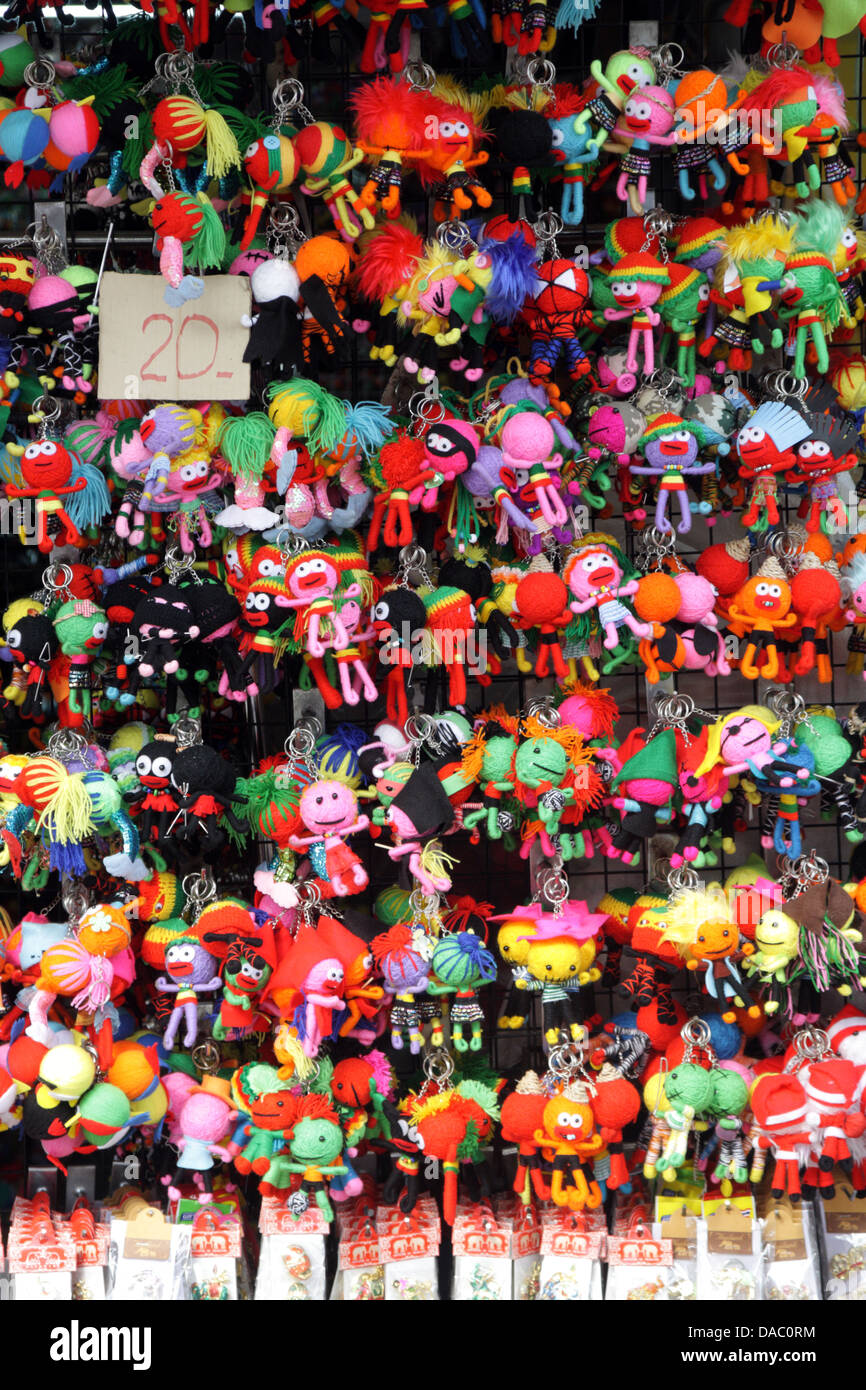 Colorful dolls display in a shop in Chatuchak Weekend Market , Bangkok , Thailand Stock Photo