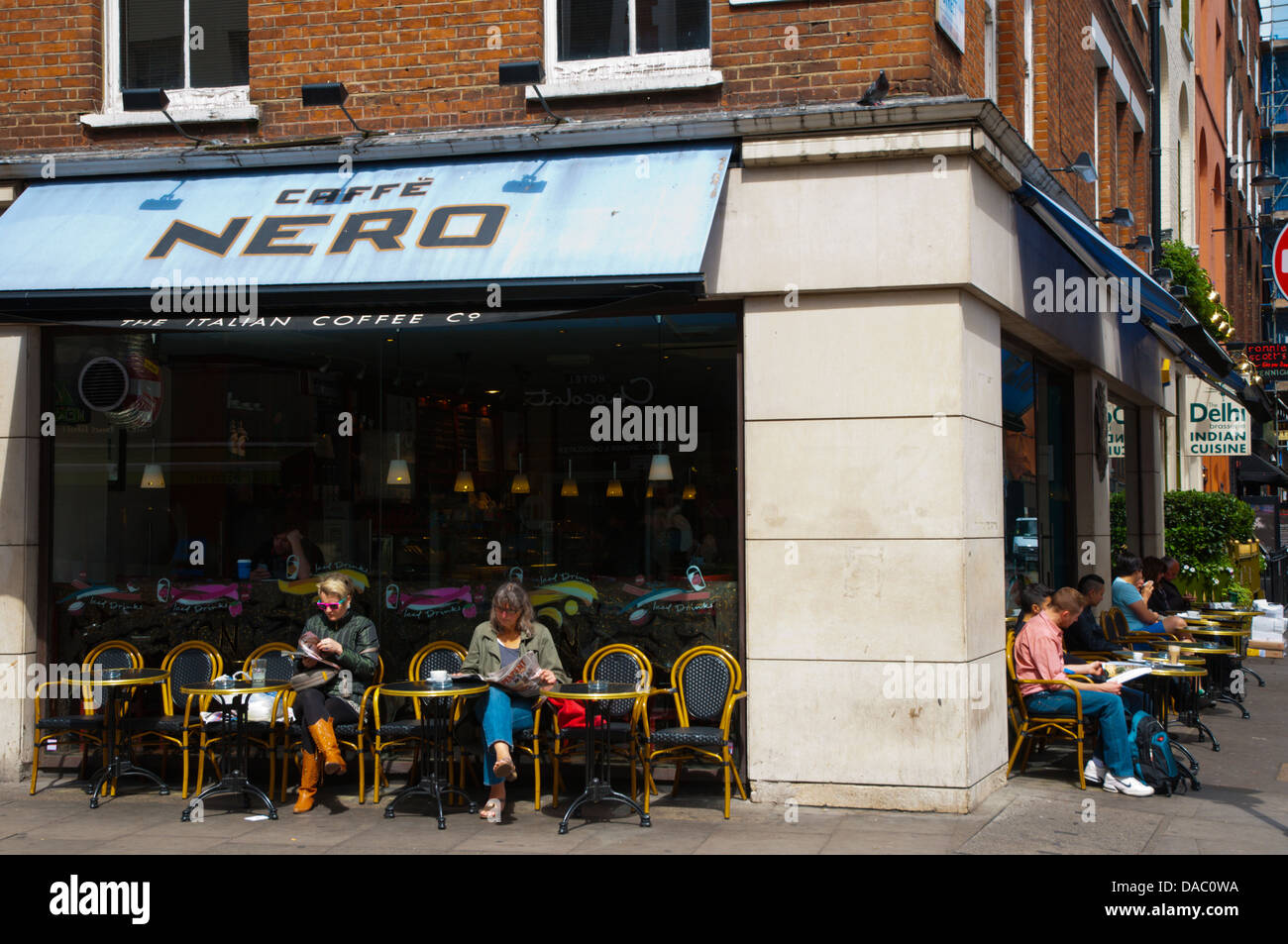 Cafe exterior Old Compton Street Soho district central London England Britain UK Europe Stock Photo