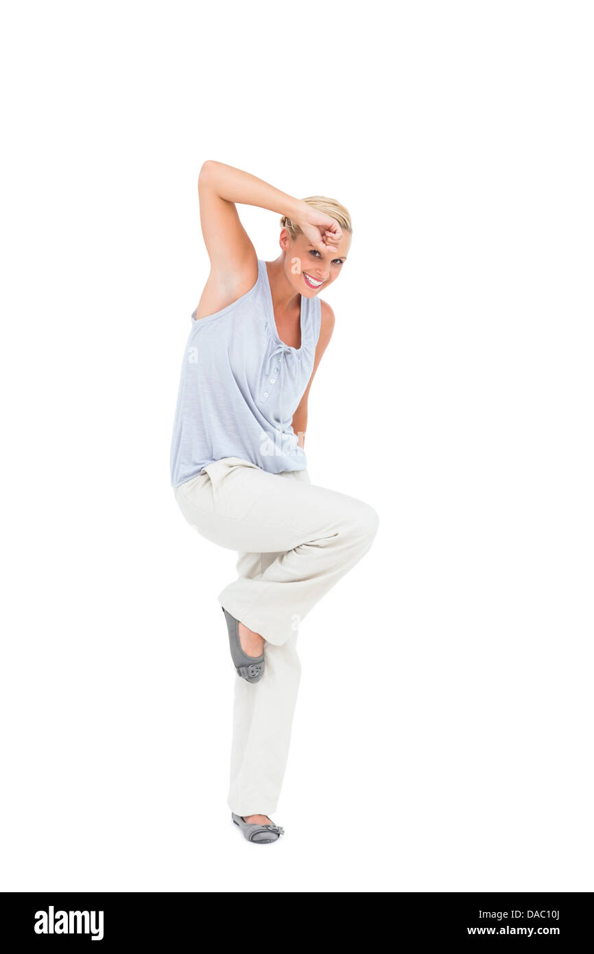 Happy woman posing and looking at camera Stock Photo - Alamy